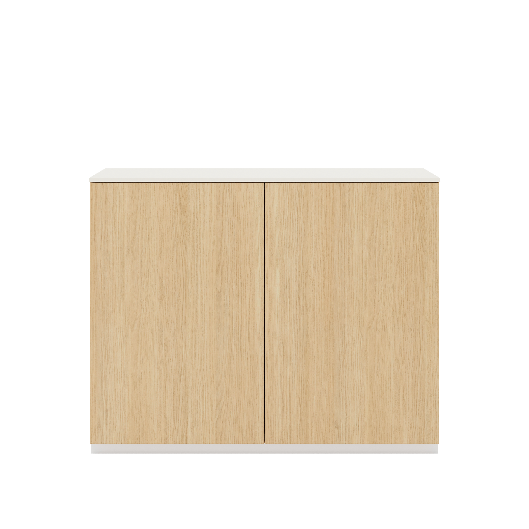 Vor weißem Hintergrund sieht man ein Sideboard aus Eichenholz. Die beiden Drehtüren haben keine Griffe. Auf dem Sideboard ist eine cremeweiße Abdeckplatte angebracht.